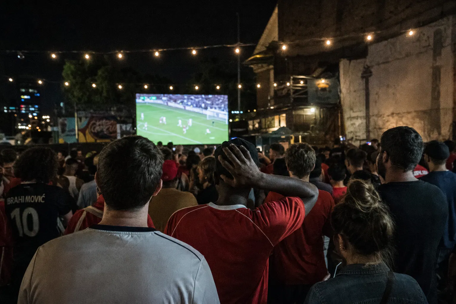 Fans watching football together